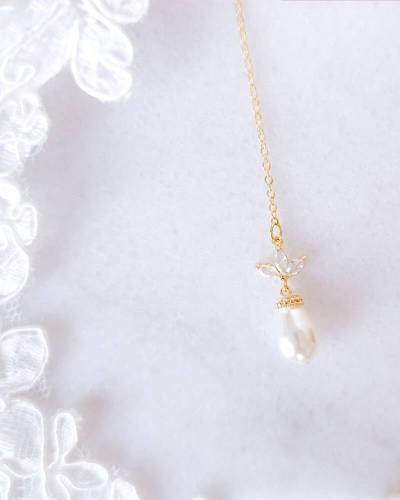 Collier de dos mariée fleur